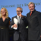 Von li. nach re.: Laudatorin Dr. Maria Furtwängler, Prof. Dieter Kosslick, Preisträger Innovationspreis, Dr. Reinhard Hofmann, Organisator und Initiator Von li. nach re.: Laudatorin Dr. Maria Furtwängler, Prof. Dieter Kosslick, Preisträger Innovationspreis, Dr. Reinhard Hofmann, Organisator und Initiator